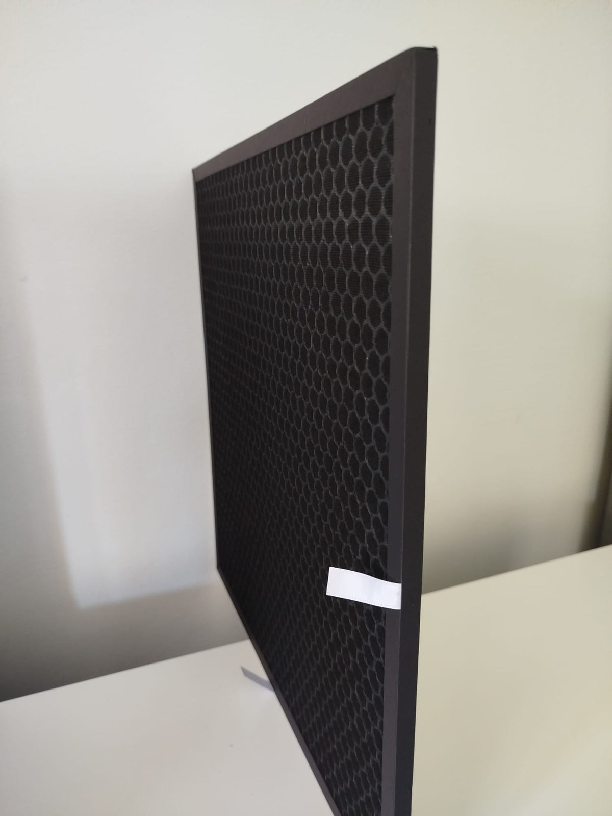 Activated carbon filter pair for Luggable Carbon — side view showing depth
