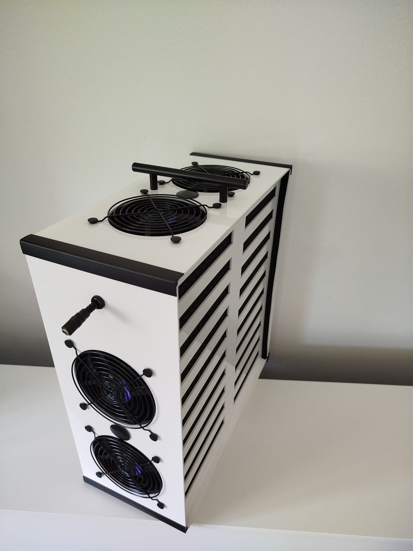 Luggable Carbon air purifier — front view on desk