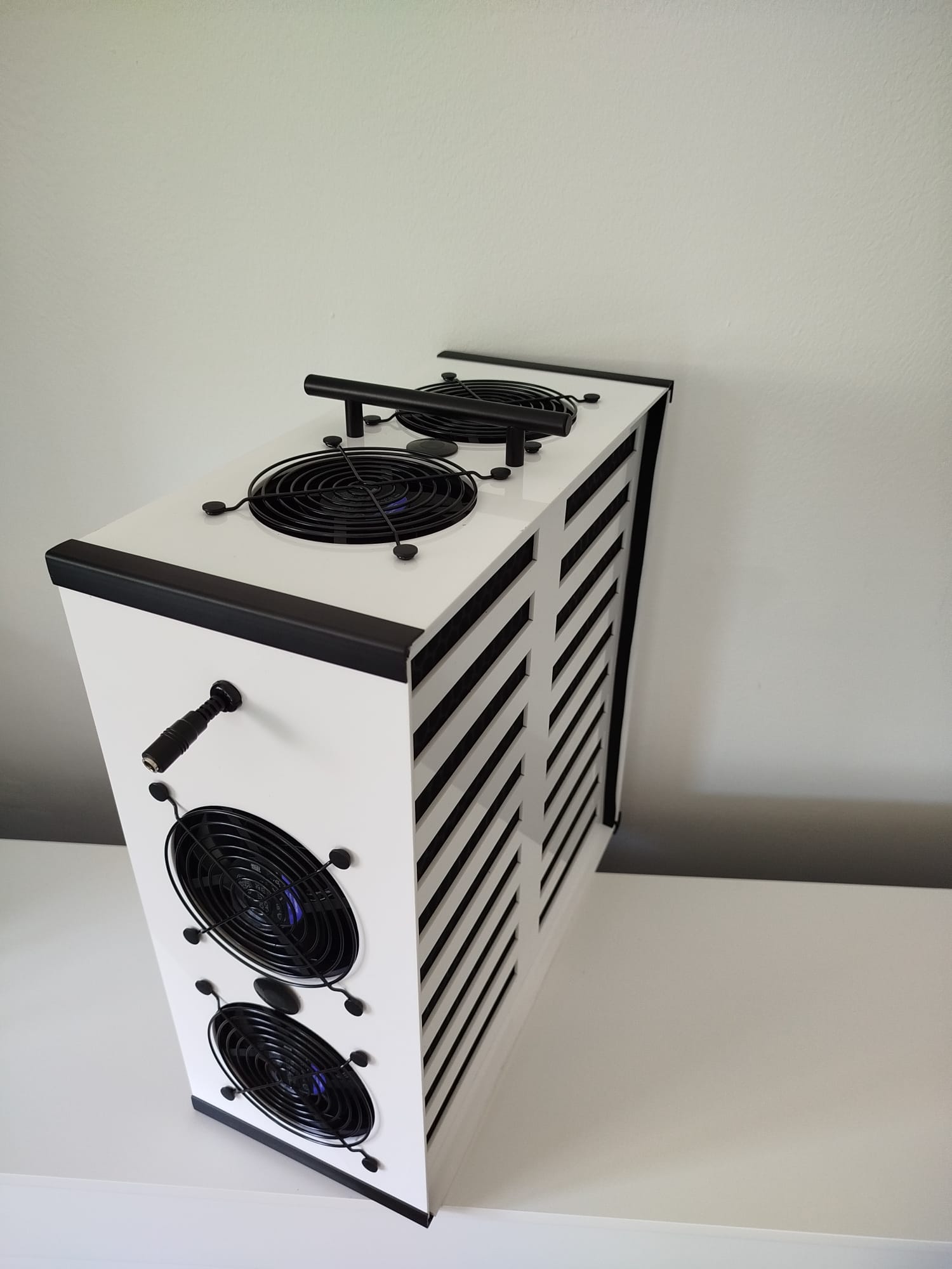 Luggable Carbon air purifier — front view on desk
